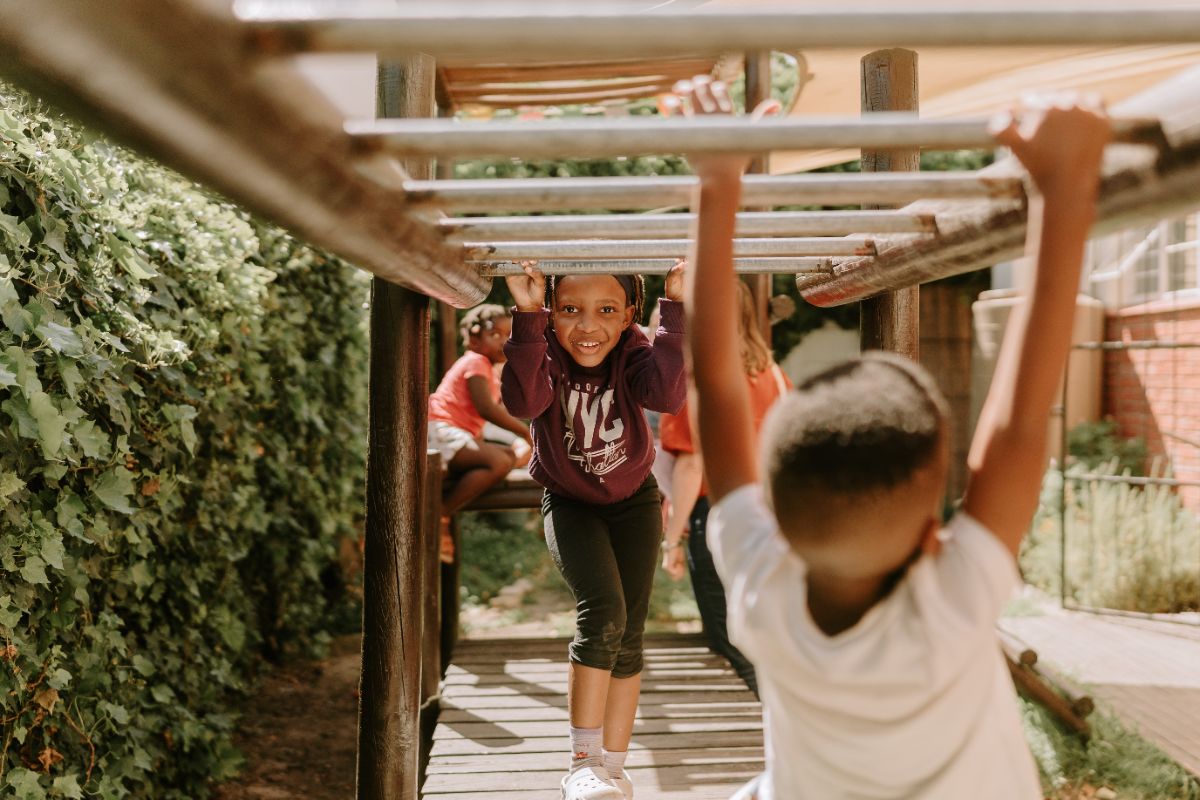A child on the monkey bars